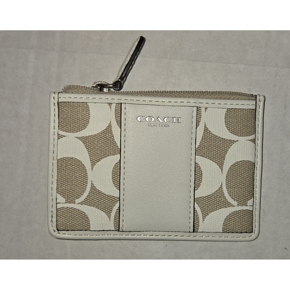 NWT Legacy Print Signature Mini SkinnyID Case. Ivory Khaki. 2013 Line